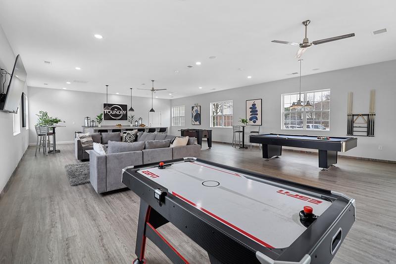 Game Room | Our game room features a billiards table and an air hockey table for your entertainment.