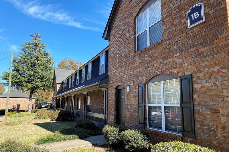 Apartments & Townhomes Available! | You'll be welcomed home by lush landscaping.