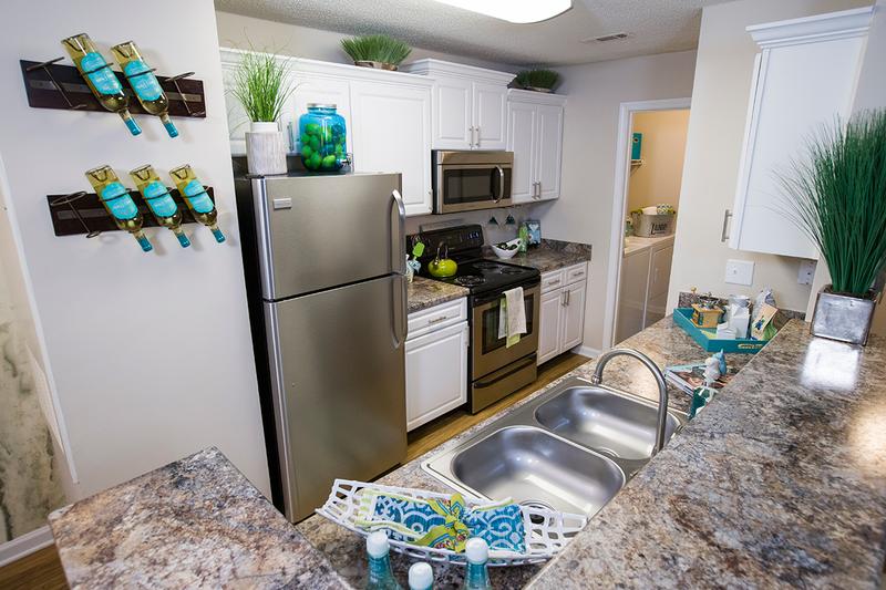 Granite-Style Kitchen | Our newly renovated kitchens feature stainless steel appliances.