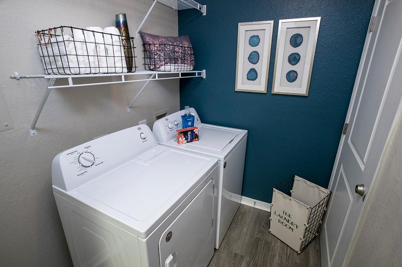 Washer & Dryer Included | Large laundry rooms boast washer and dryer sets in every apartment home.