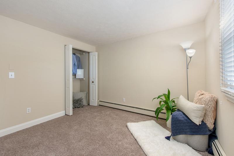 Bedroom | Spacious bedroom featuring plush carpeting and a large window.
