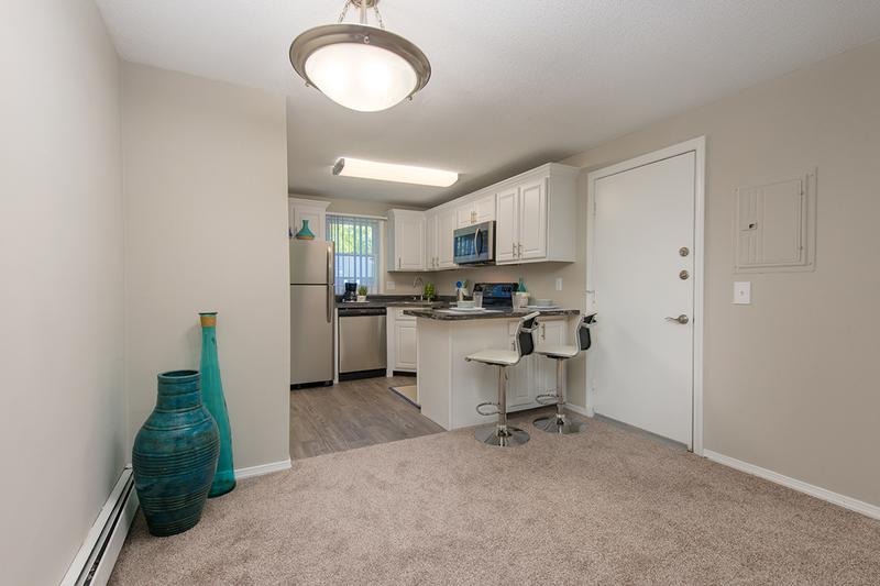 Breakfast Bar | Kitchens feature a breakfast bar overlooking the living area.