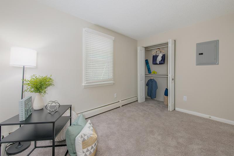 Bedroom | Spacious bedrooms featuring plush carpeting and spacious closets.