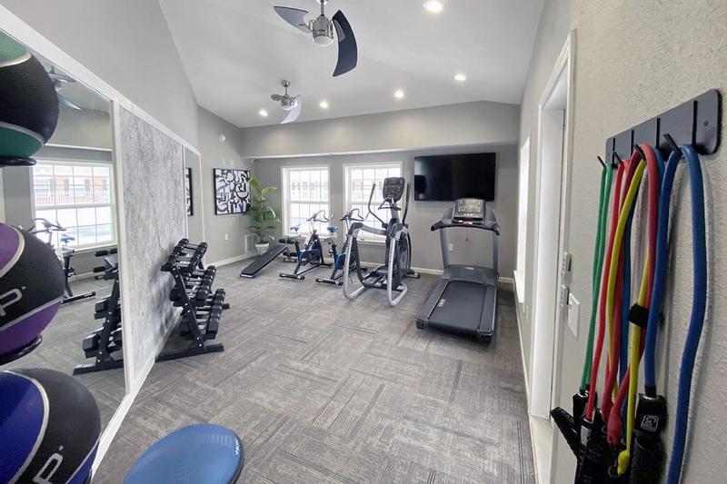 Fitness Center | Get fit in our brand new fitness center featuring all the cardio and weight training equipment you need for a full body workout.