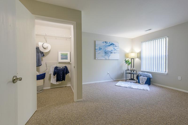 Master Bedroom | Master bedrooms featuring walk-in closets with built-in organizers and a master bathroom.