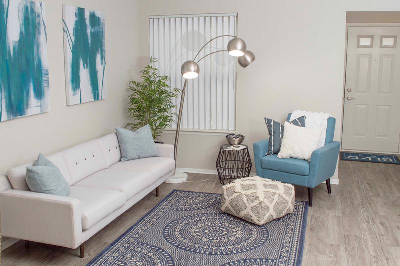 Living Room | Spacious, open living room that opens up to the kitchen and dining areas.