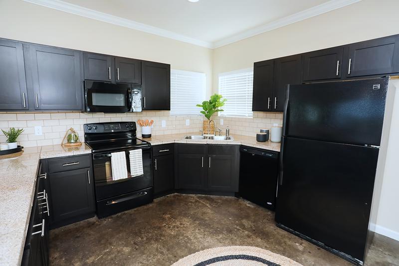 Kitchen | Kitchens featuring marble countertops and ample cabinetry.