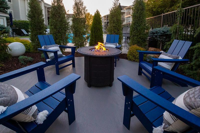 Poolside Firepit | AMAZING RENOVATIONS SPRING 2022! Warm up by the poolside firepit (coming soon).