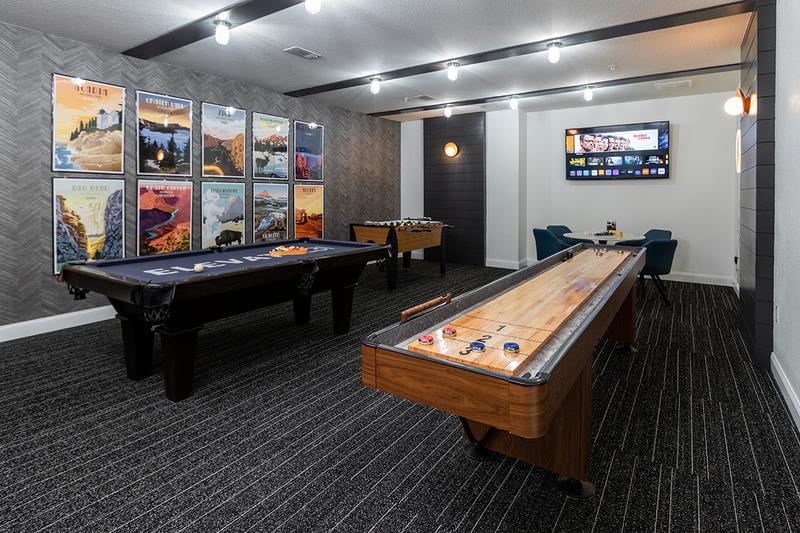 State of the Art Game Room | Head over to the game room to play shuffle board, pool or foosball.
