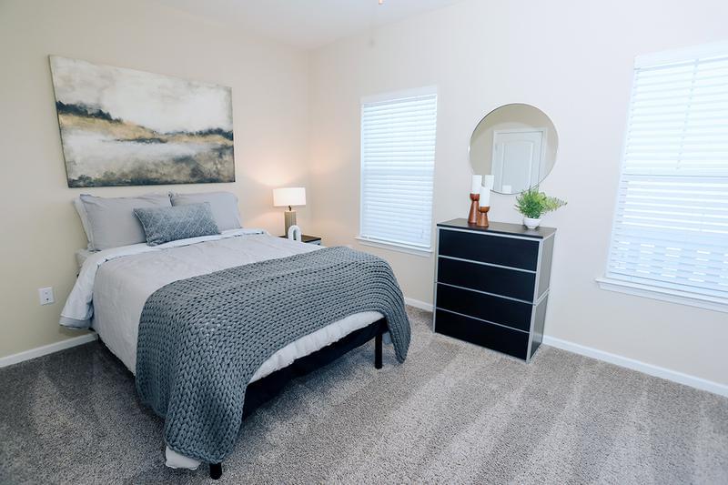 Bedroom | Each bedroom boasts spacious closets and plush carpeting.