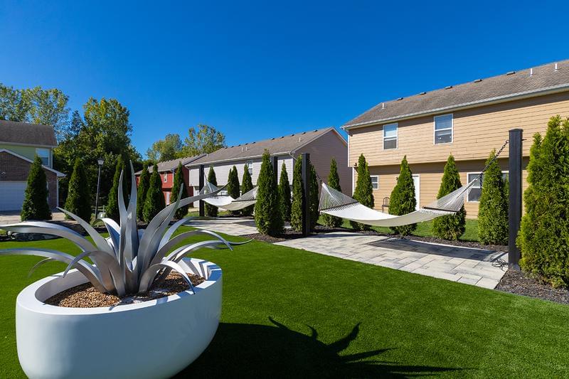 Hammock Garden | Lay out and soak in the sun from one of our hammocks.