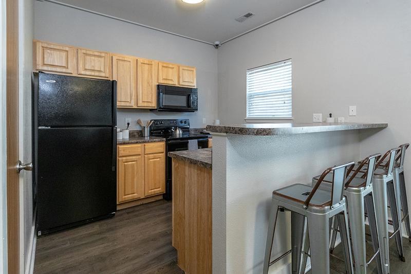 Open Kitchen with Breakfast Bar | Open kitchens with a breakfast bar for entertaining.