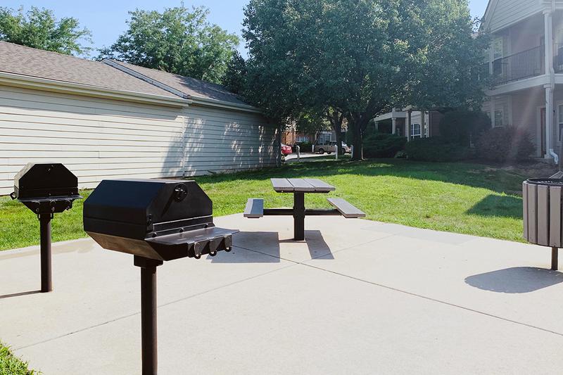 BBQ Grills | Have a cookout at our picnic area featuring charcoal grills and picnic tables.