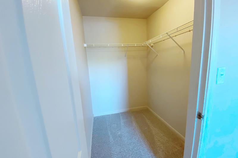 Walk-In Closet | Master bedrooms feature walk-in closets with built-in organizers.