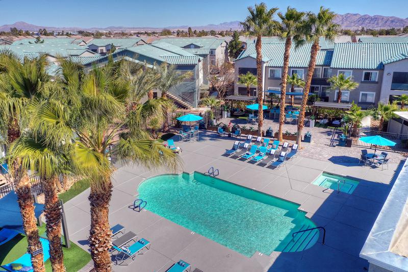 Aerial View of Pool | Our expansive resort-style pool and sundeck even features a spa and loungers.