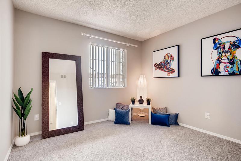Bedroom | Spacious bedrooms featuring a ceiling fan and a spacious closet.