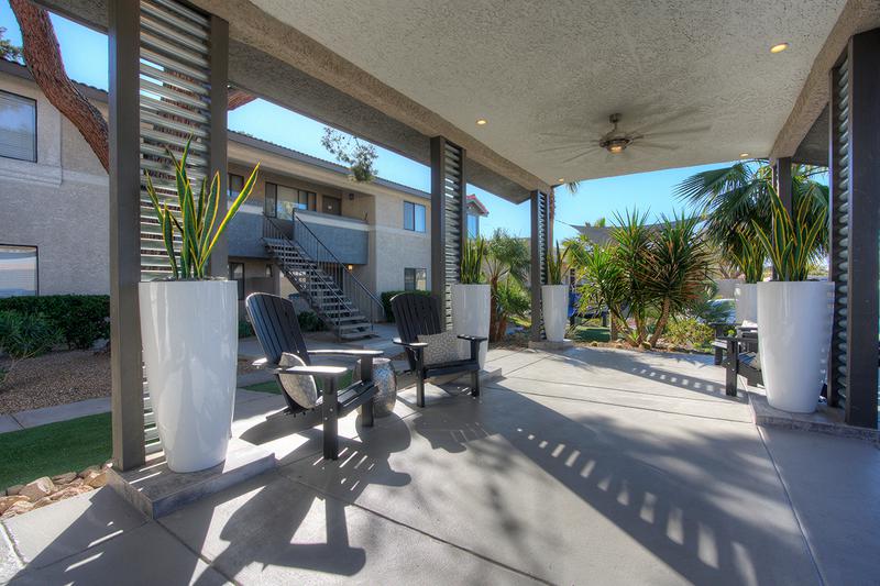 Outdoor Seating Area | Have a seat outside the leasing office under our shaded entryway with ceiling fan.