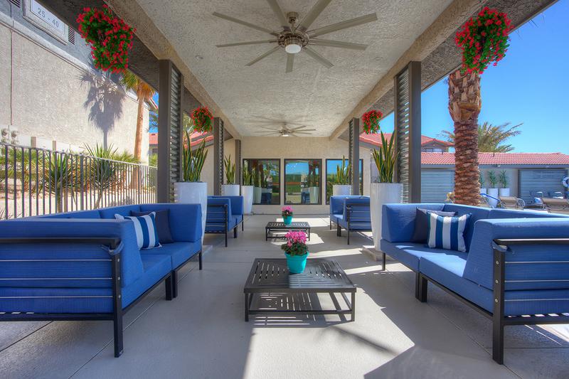 Poolside Seating Area | Enjoy our poolside seating area and get some shade.