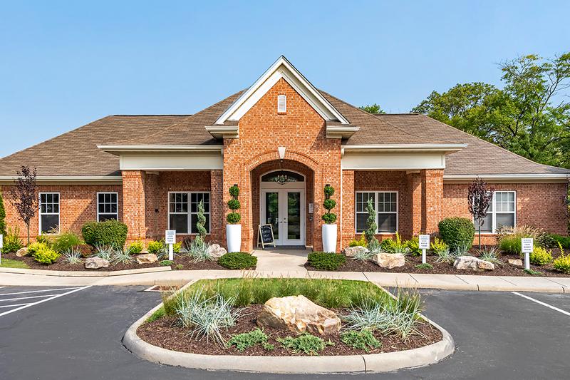 Clubhouse Exterior | Come on in...our friendly staff is waiting to help you find your new home.