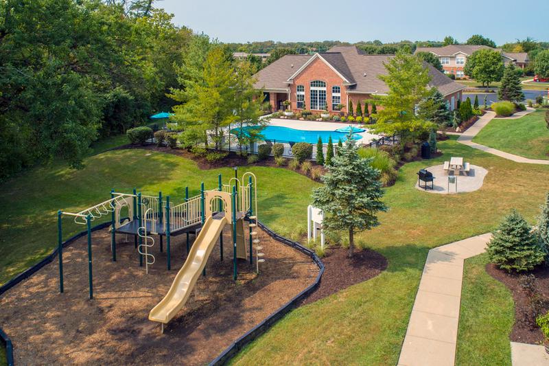 Aerial View of Amenities | At The Reserve at Monroe Crossings, you'll have access to all of our resort-style amenities including a pool, playground, and picnic area.