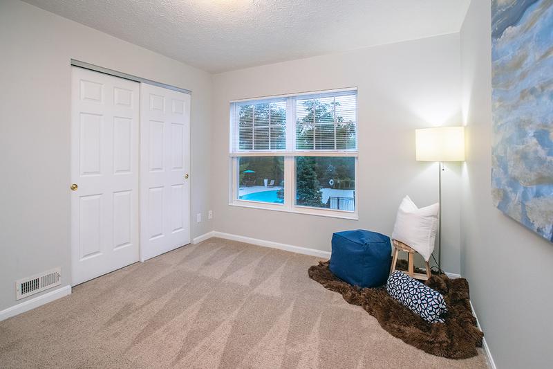 Bedroom | Spacious bedrooms featuring plush carpeting and closets with organizers.