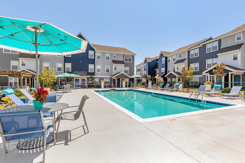 Expansive Sundeck | Tranquil pool deck and lounge chairs are perfect for sun tanning