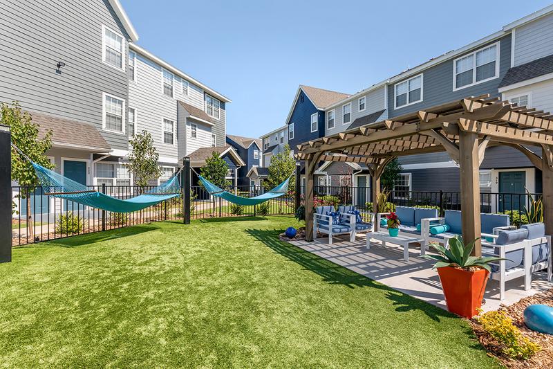 Hammock Garden | Relax out by the pool on our relaxation hammocks.