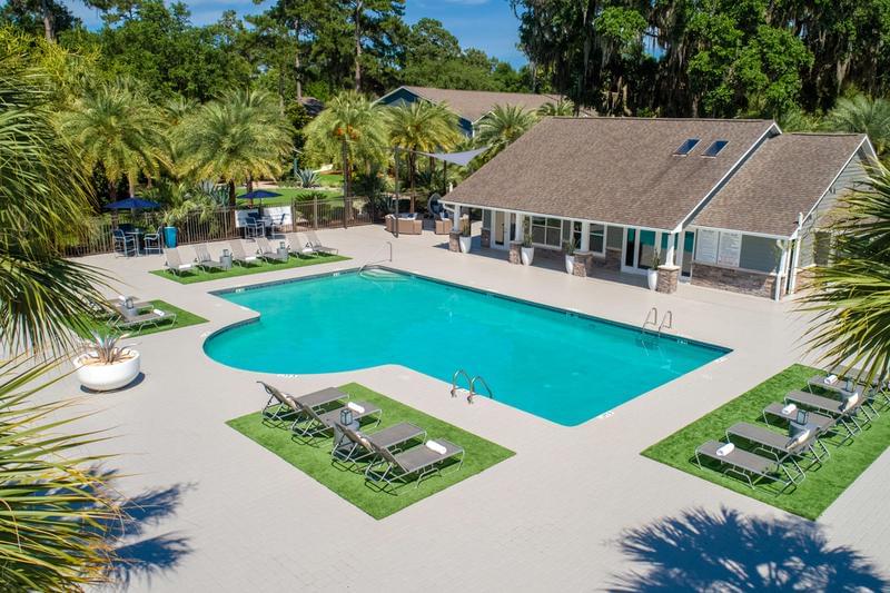 Aerial View of Pool | A bird's eye view of our pool, poolside seating and sundeck.