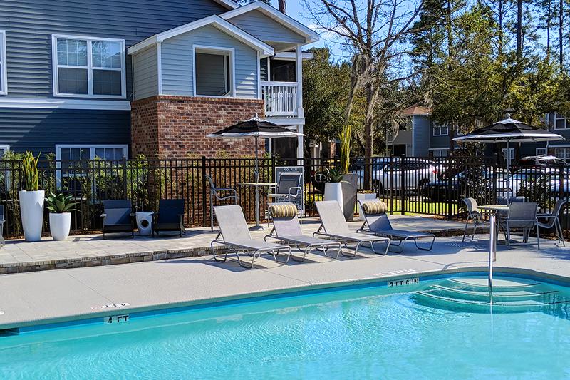 Poolside Seating | Relax after a long day by the pool in our poolside seating.