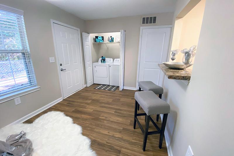 Laundry Area | Convenient in-home laundry room area provides shelving for storage as well as full sized, energy efficient washer dryers included in every home!