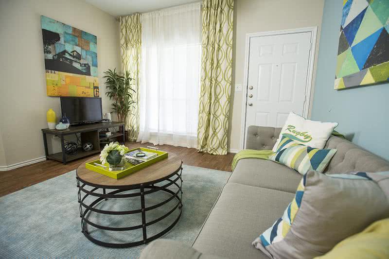 Living Room | Living rooms feature large windows, allowing ample sunlight to shine through.