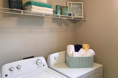 Laundry Room | Full size washer and dryer appliances included in all apartment homes.