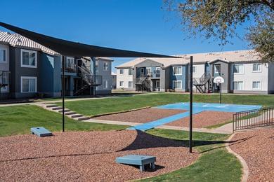 Outdoor Recreation | Our outdoor recreation area features cornhole and a basketball court.