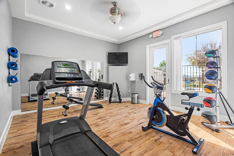 State-of-the-Art Fitness Center | Get fit in our resort-style fitness center featuring all the equipment you need for a full body workout.