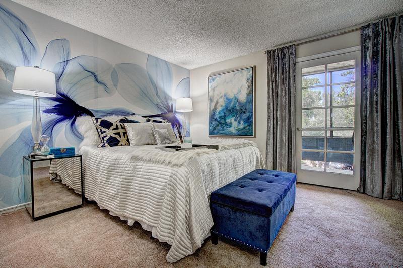 Master Bedroom | Master bedrooms featuring a walk-in closet and a private patio.