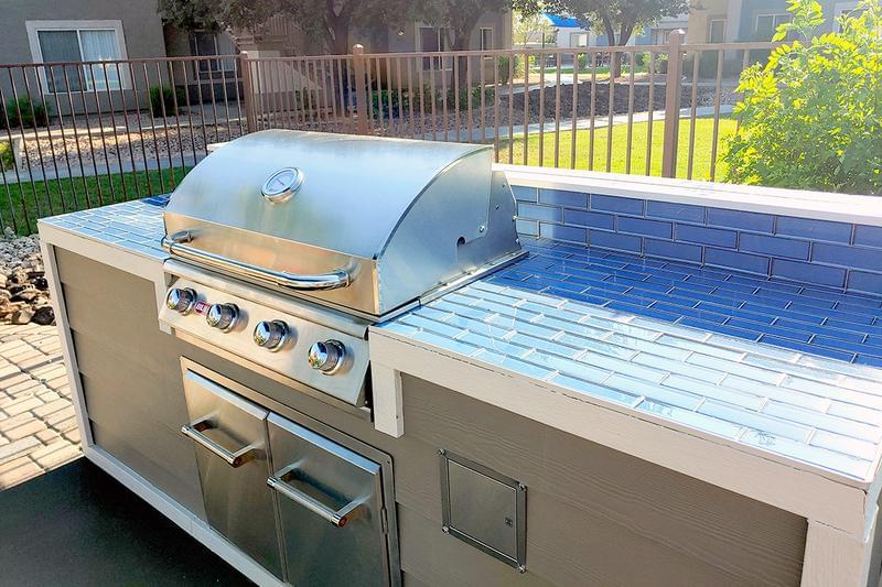 Gas Grill | Our poolside picnic area features a gas grill.