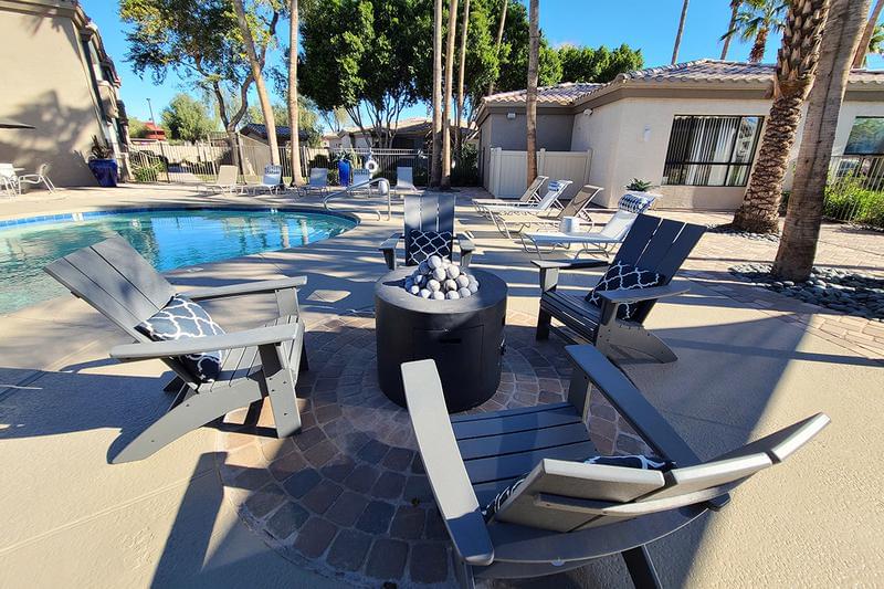 Firepit | Warm up around our poolside firepit. 