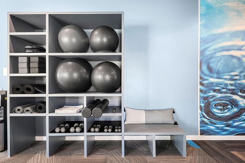 Equipment | Our fitness center features weights, mats, and exercise balls.