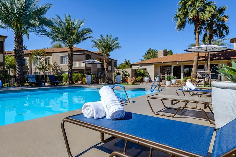Poolside Loungers | Lay out and soak in the sun on our expansive sundeck complete with loungers and tables. 