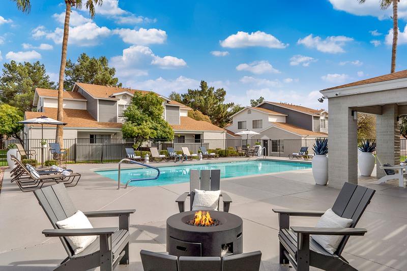 Firepit | Warm up around our poolside firepit.