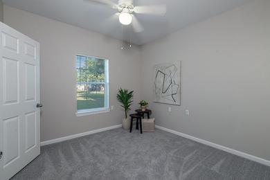 Bedroom | Bedrooms featuring plush carpeting, ceiling fans and ample closet space.