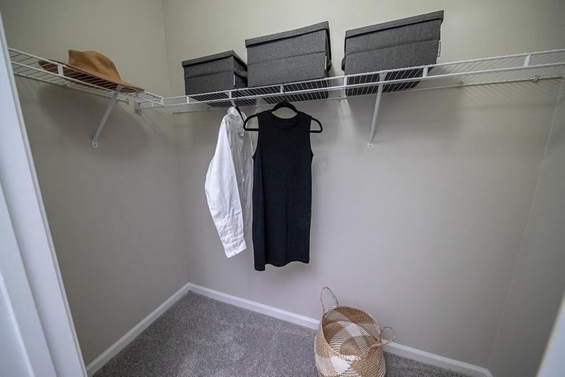 Walk-In Closets | Master bedrooms featuring spacious walk-in closets with built-in organizers.