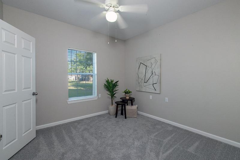 Multi Speed Ceiling Fans | Bedrooms feature multi-speed ceiling fans and plush carpeting.