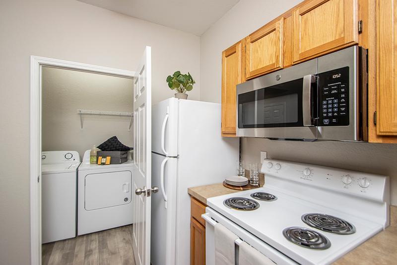 Full Size Washer & Dryer | Apartment homes include a full-size washer and dryer appliance for your convenience.