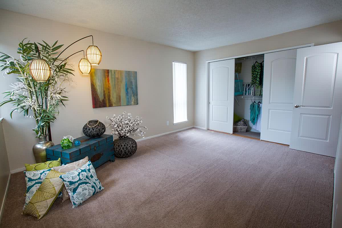 Your spacious bedroom features closets with built-in shelving.