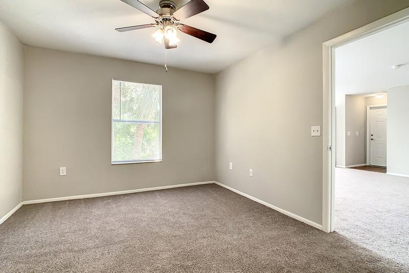 Bedroom | Spacious bedrooms featuring plush carpeting and spacious closets.