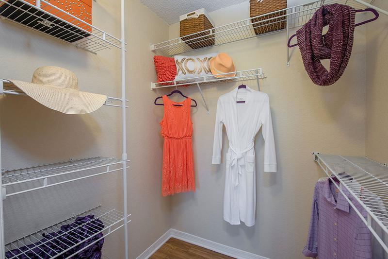 Walk-In Closet | Master bedrooms feature walk-in closets with built-in organizers.