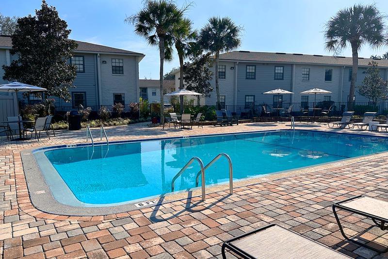 Resort-Style Pool | At the center of our community, is our newly renovated resort-style pool, with plenty of lounge seating, perfect for enjoying the Gainesville sun.