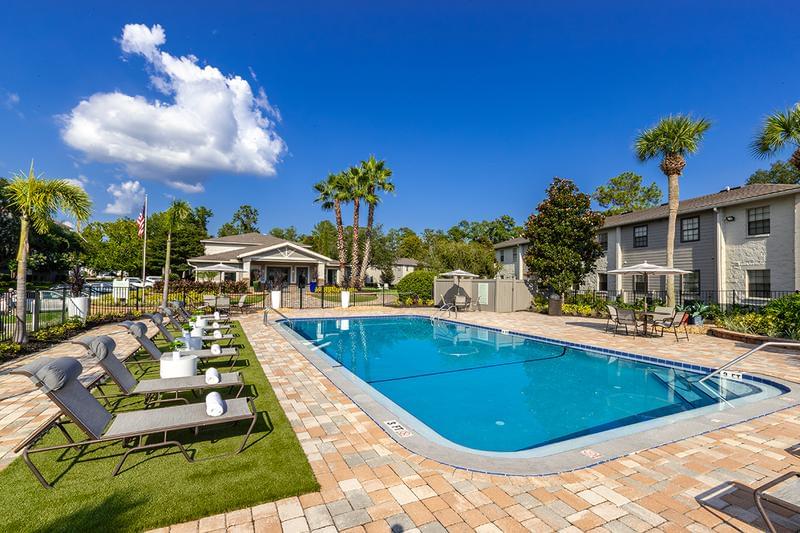 Resort-Style Pool | At the center of our community, is our newly renovated resort-style pool, with plenty of lounge seating, perfect for enjoying the Gainesville sun.