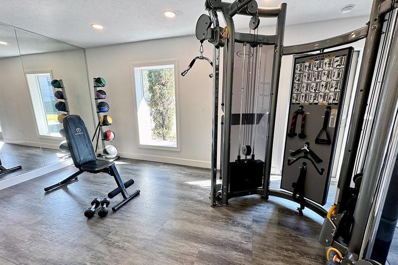 Weight Training Equipment | Get fit in our resident fitness center offering all the cardio and weight training equipment you need for a full body workout.